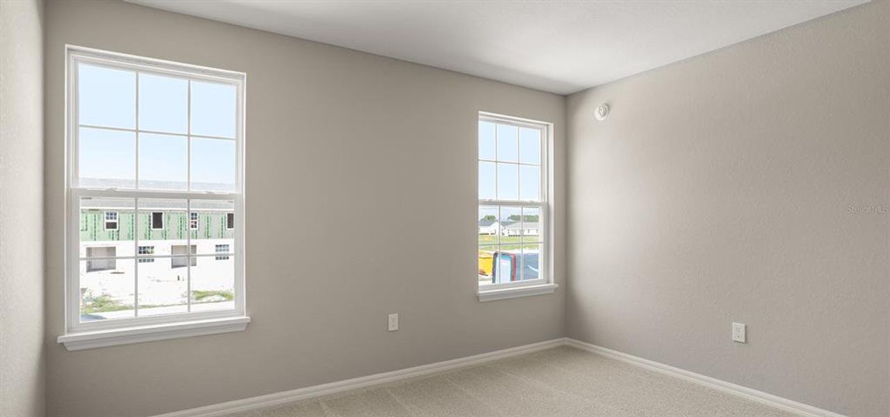 Spacious, unfurnished interior of a new home in Harbor at Lake Henry - Townhomes, Winter Haven (Image 18).