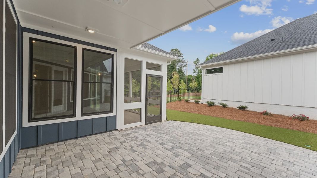 Exterior details and patio area of a home in The Courtyards at Redbud Lane, Canton (Image 3). Exterior details and patio area of a home in The Courtyards at Redbud Lane, Canton (Image 3).