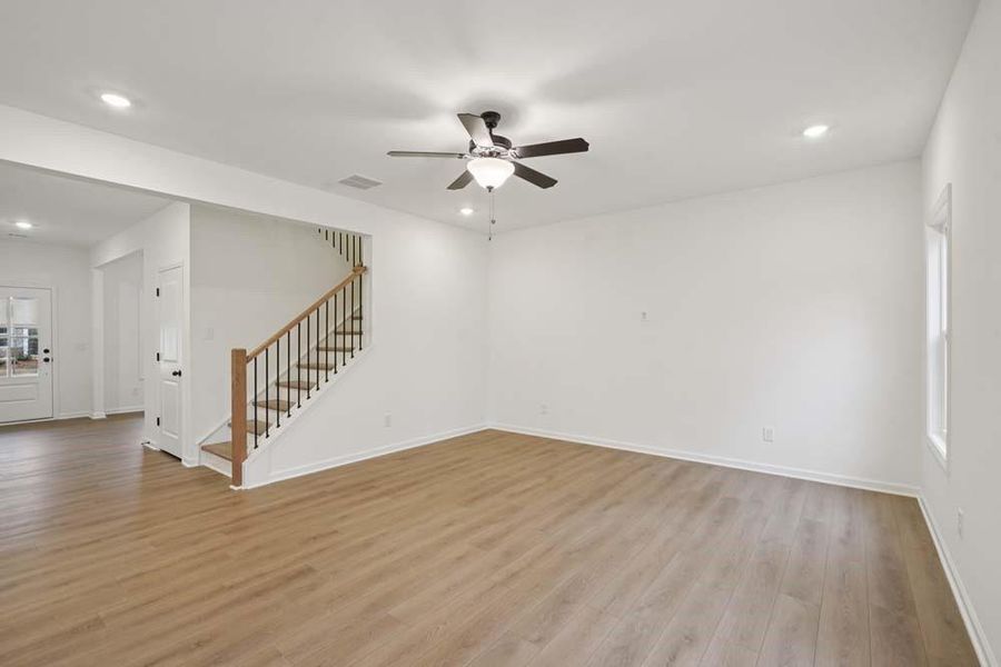 Spacious, unfurnished interior of a new home in Eastlyn Crossing, Flowery Branch (Image 11).