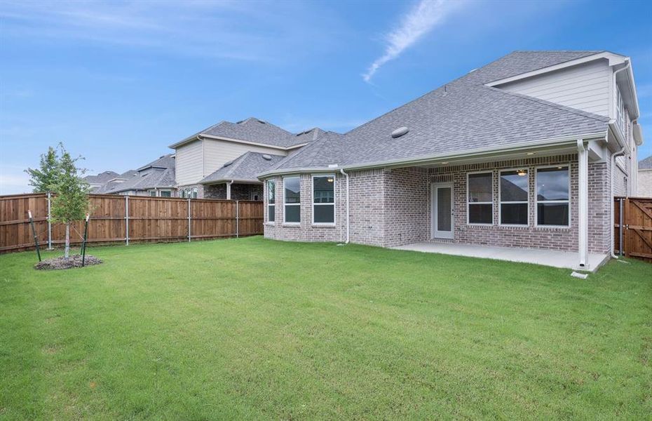 Oversized yard  *Real home pictured