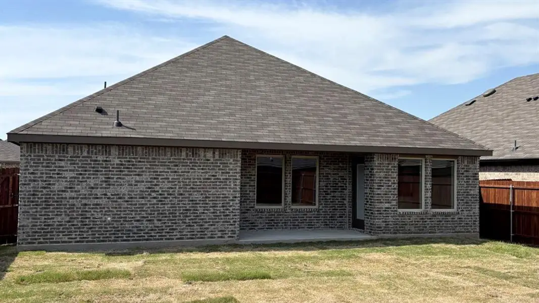 Exterior details and patio area of a home in Stonewyck Farms, Ennis (Image 3).