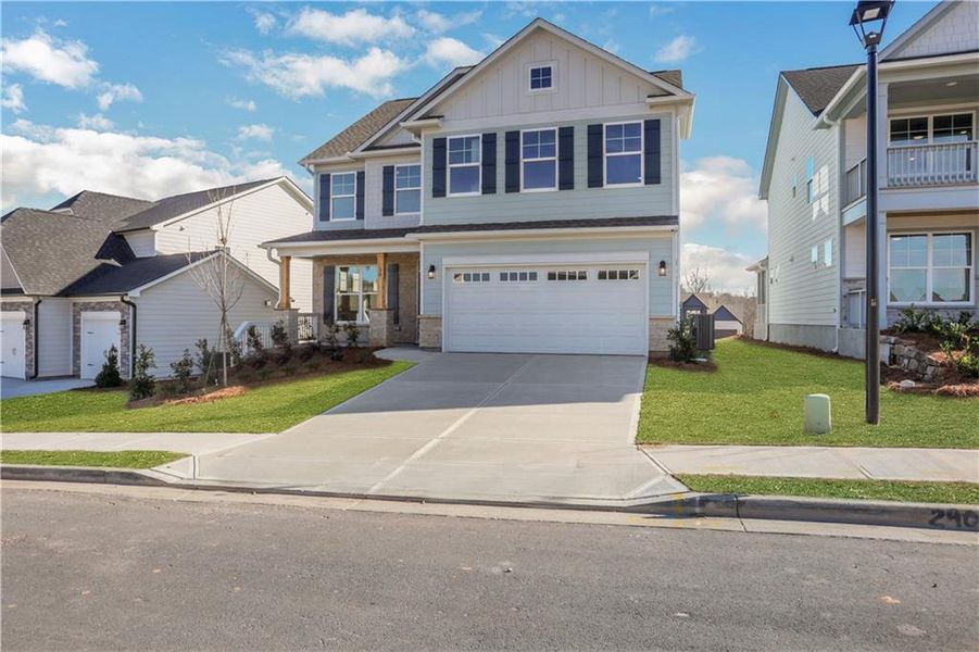 Front exterior of a new home in Twin Lakes, Hoschton, GA, highlighting curb appeal (Image 2).