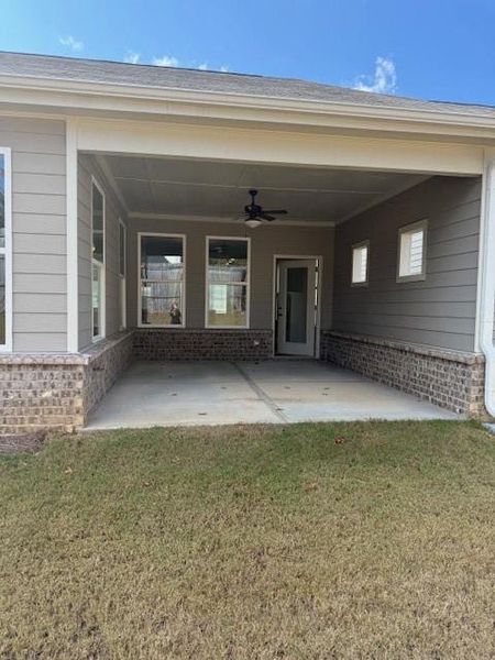 Exterior details and patio area of a home in Cooper's Walk, Loganville (Image 3).