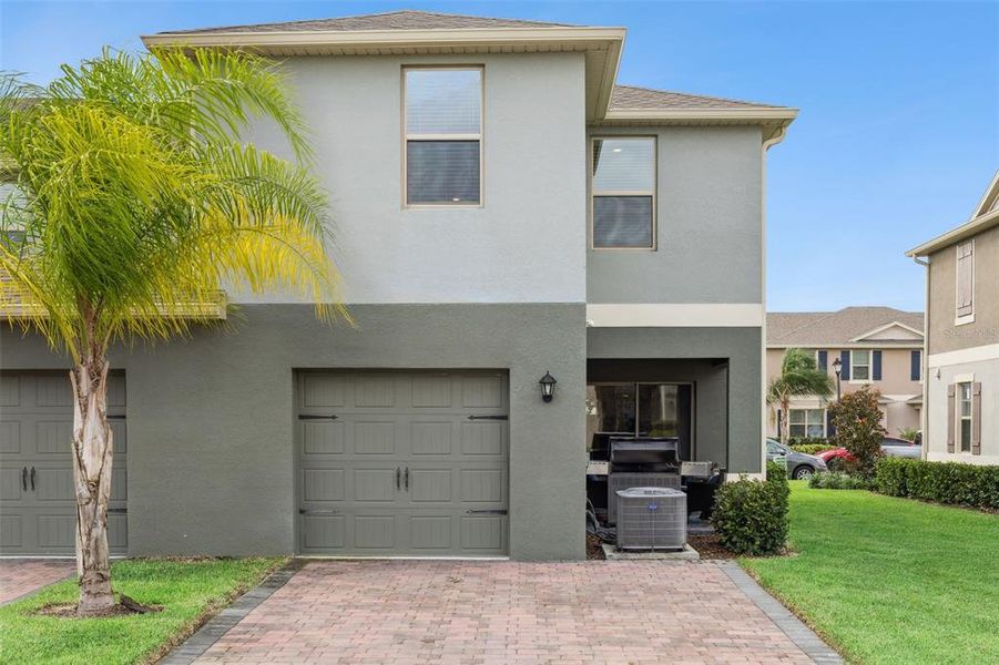 Exterior details and patio area of a home in Waterleigh, Winter Garden (Image 2). Exterior details and patio area of a home in Waterleigh, Winter Garden (Image 2).