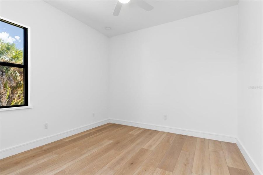 Spacious, unfurnished interior of a new home in , Port Charlotte (Image 28).