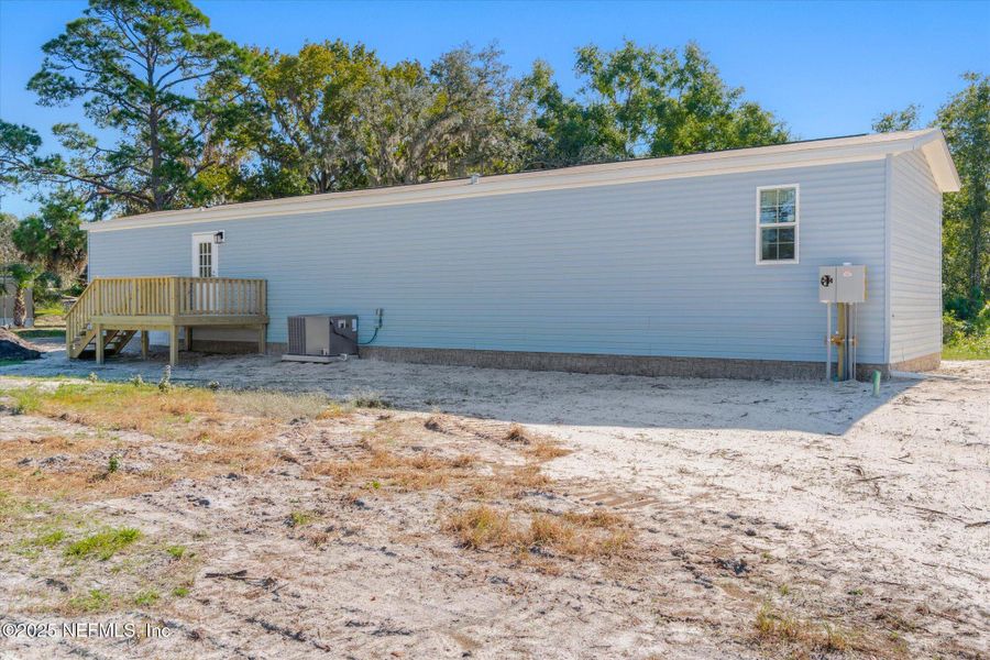 Exterior details and patio area of a home in , East Palatka (Image 1). Exterior details and patio area of a home in , East Palatka (Image 1).
