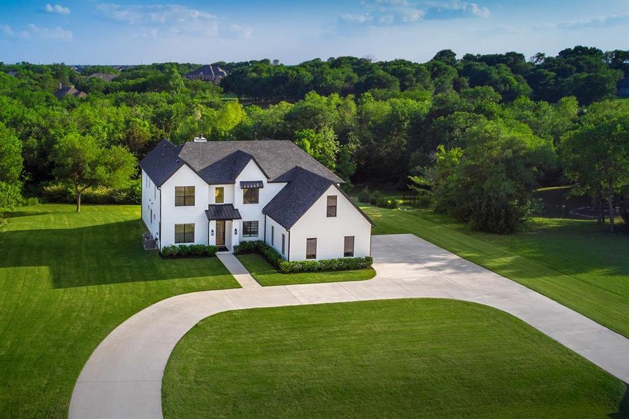 Front exterior of a new home in , McKinney, TX, highlighting curb appeal (Image 20).