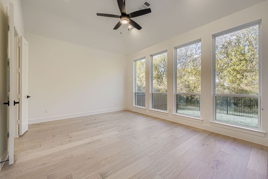 Plan 1643 primary bedroom representative photo