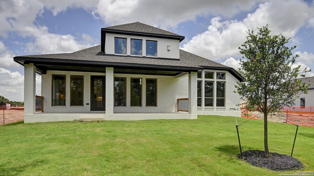 Front exterior of a new home in Esperanza 60', Boerne, TX, highlighting curb appeal (Image 21). Front exterior of a new home in Esperanza 60', Boerne, TX, highlighting curb appeal (Image 21).