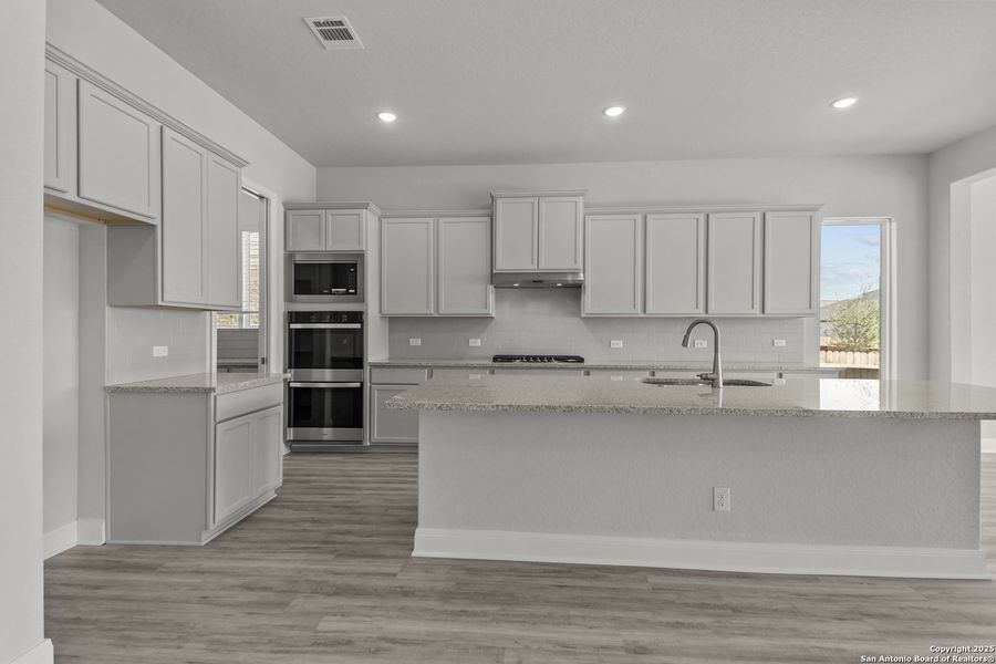 Furnished interior view inside a new home in Stillwater Ranch 45', San Antonio (Image 5).