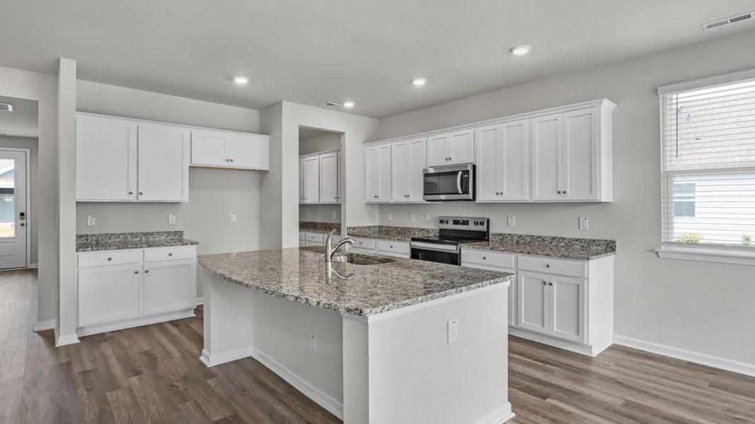 Furnished interior view inside a new home in Magnolia Ridge at Blake Farm, Wilmington (Image 9).