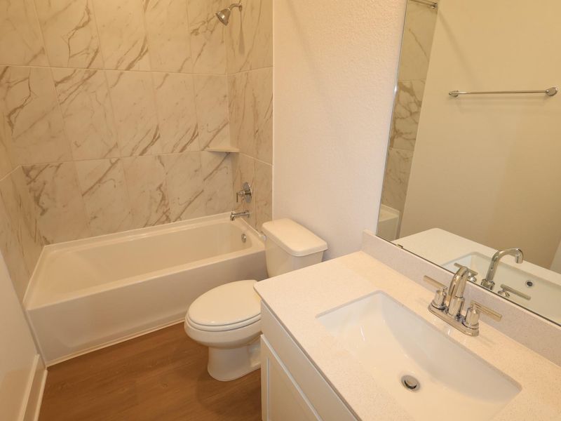 Furnished interior view inside a new home in Sorella, Tomball (Image 11).