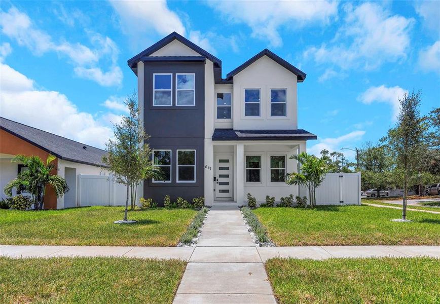 Front exterior of a new home in , St. Petersburg, FL, highlighting curb appeal (Image 29). Front exterior of a new home in , St. Petersburg, FL, highlighting curb appeal (Image 29).
