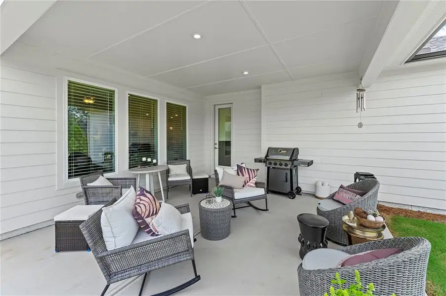 Exterior details and patio area of a home in Crescent Pointe at Great Sky, Canton (Image 4).