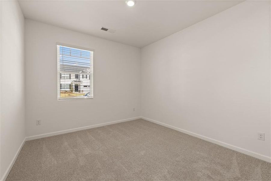 Spacious, unfurnished interior of a new home in Preserve at Dove Creek, Statham (Image 32).