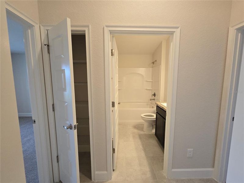 hallway with linen closet hallway with linen closet