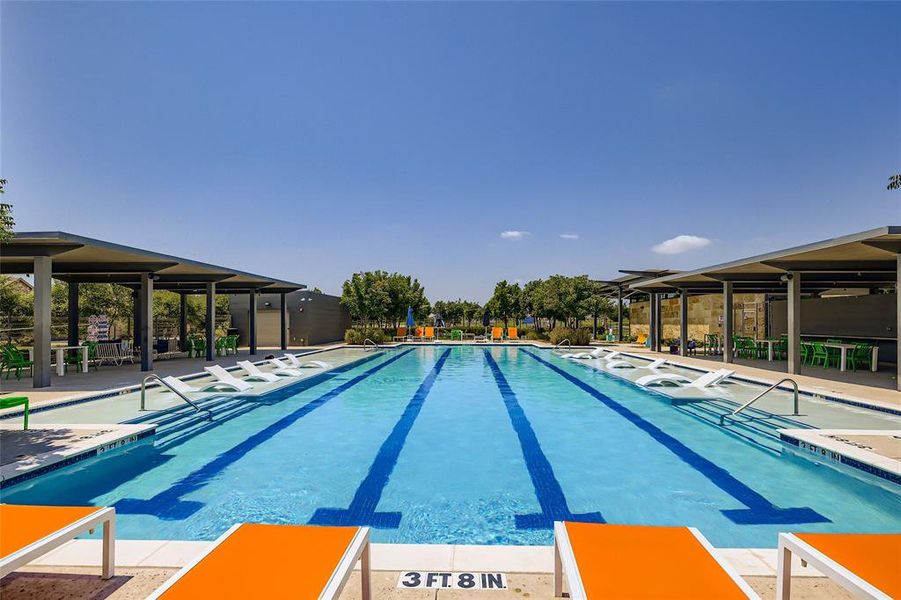 Community pool with a patio area