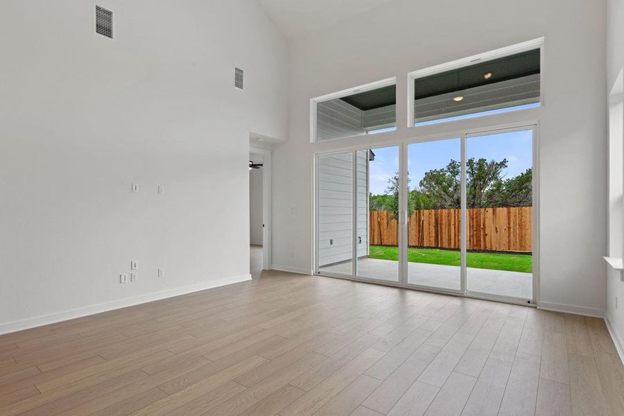 Spacious, unfurnished interior of a new home in Heritage, Dripping Springs (Image 36).