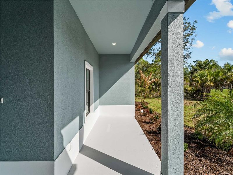 Exterior details and patio area of a home in , North Port (Image 28).