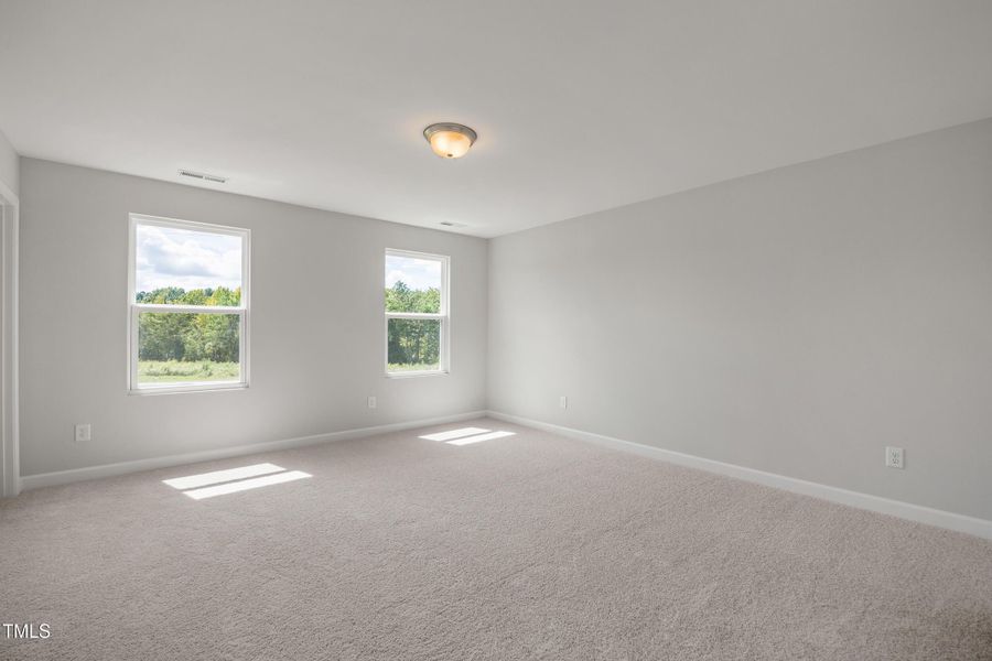 Spacious, unfurnished interior of a new home in Woodland Crossing, Zebulon (Image 17).