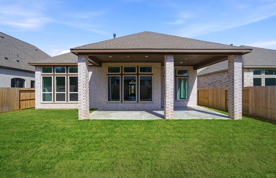 Exterior details and patio area of a home in The Highlands 55′, Porter (Image 25).
