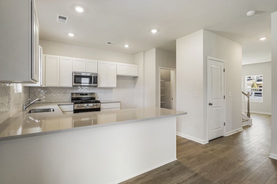 Furnished interior view inside a new home in Richmond Hill, Inman (Image 7).
