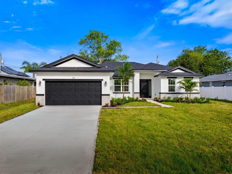 Front exterior of a new home in , Port St. Lucie, FL, highlighting curb appeal (Image 20). Front exterior of a new home in , Port St. Lucie, FL, highlighting curb appeal (Image 20).
