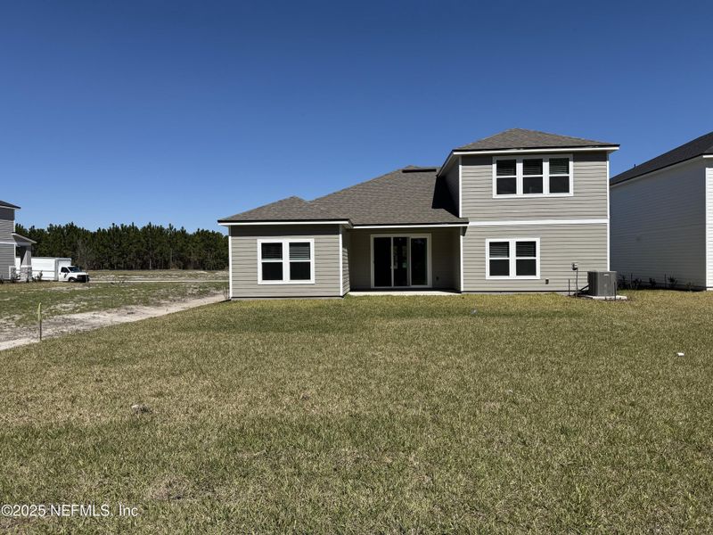 Front exterior of a new home in , Green Cove Springs, FL, highlighting curb appeal (Image 21).