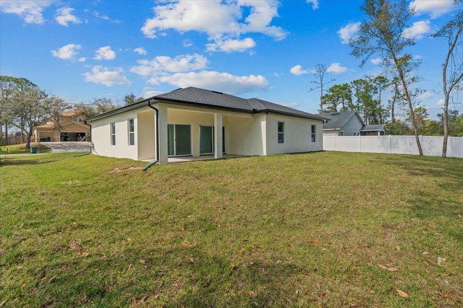 Exterior details and patio area of a home in , Deltona (Image 23).