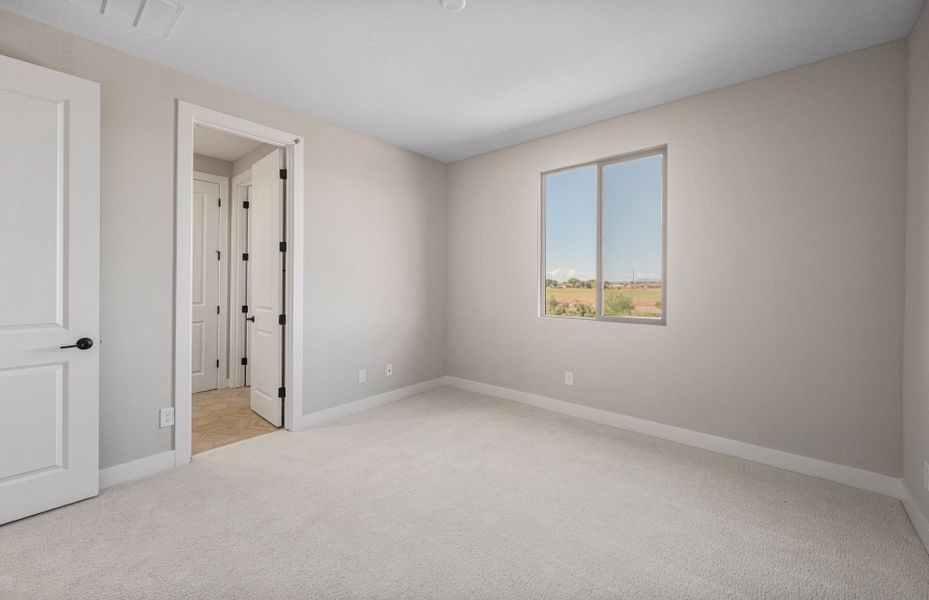 Spacious, unfurnished interior of a new home in Legado West, Queen Creek (Image 26).