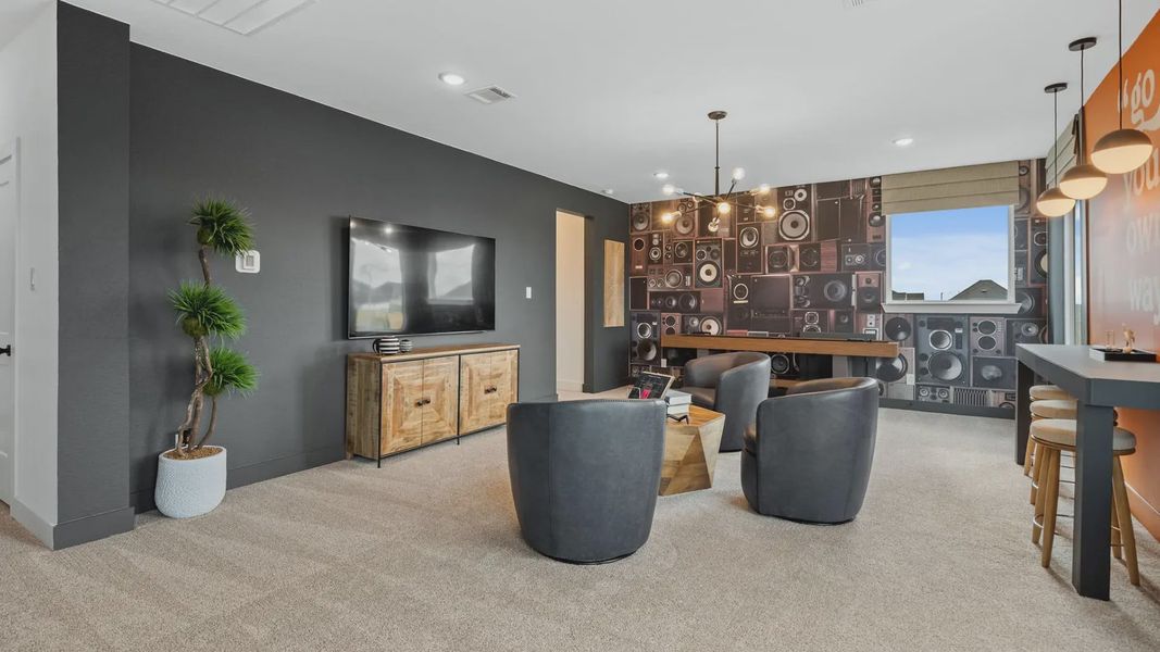 Representative furnished interior of a home built from the Acadia by Chesmar Homes in Elyson 50's, Katy (Image 25).