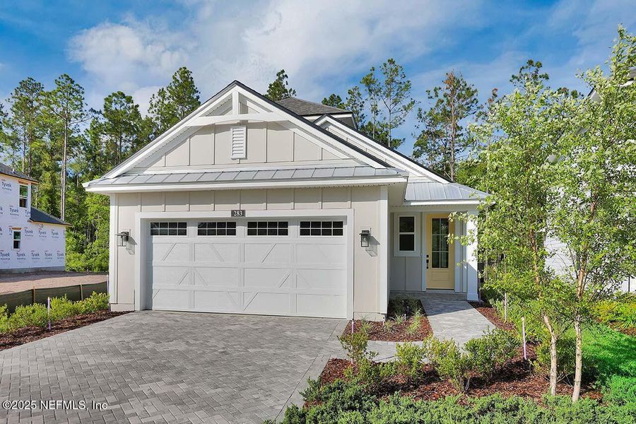 Front exterior of a new home in Reflections at Nocatee, Ponte Vedra, FL, highlighting curb appeal (Image 2). Front exterior of a new home in Reflections at Nocatee, Ponte Vedra, FL, highlighting curb appeal (Image 2).