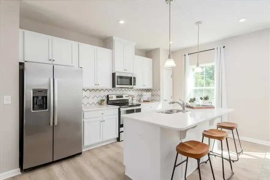 Representative furnished interior of a home built from the Beethoven Rear Entry by Ryan Homes in The Towns at Millwood, Charlotte (Image 2).