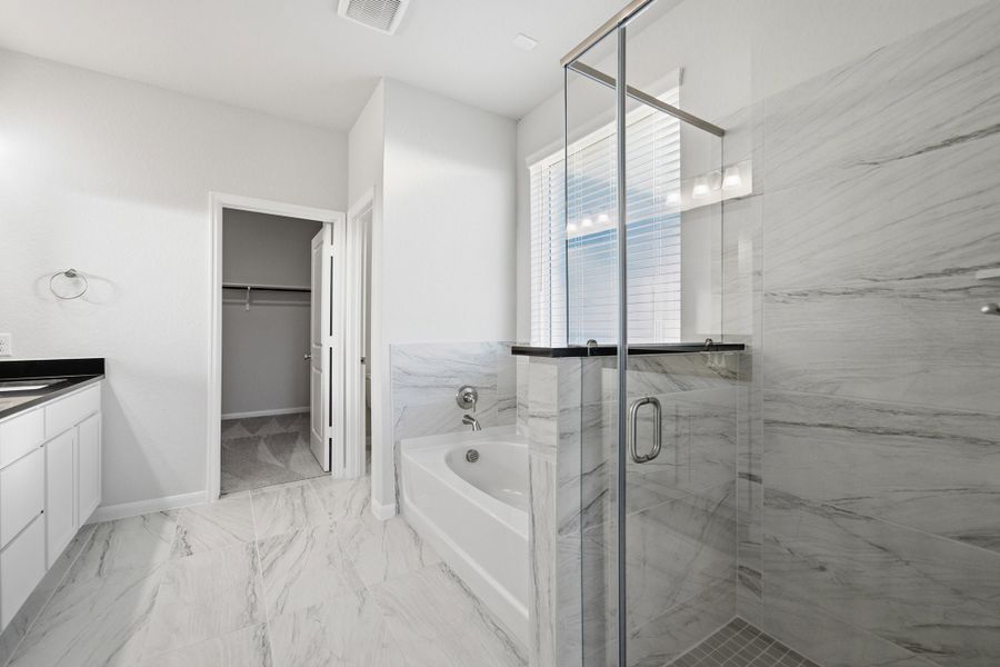 Furnished interior view inside a new home in The Woodlands at Medina Hills, Mico (Image 12).