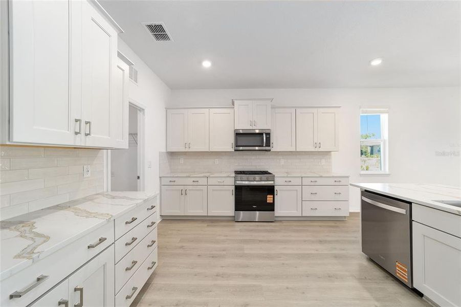 Furnished interior view inside a new home in , Ocala (Image 7).