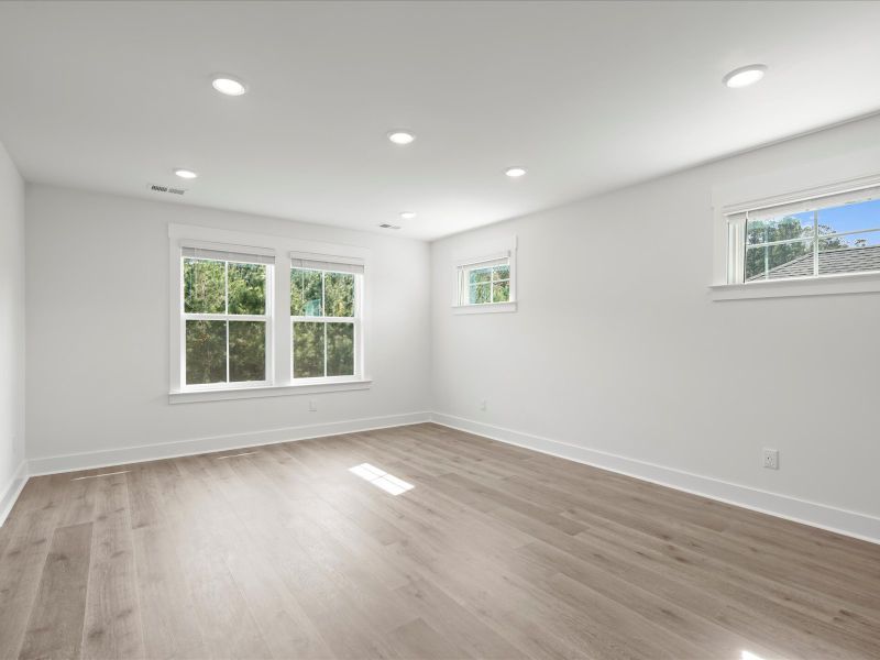 Spacious, unfurnished interior of a new home in The Coves at Lakes of Cane Bay, Summerville (Image 24). Spacious, unfurnished interior of a new home in The Coves at Lakes of Cane Bay, Summerville (Image 24).