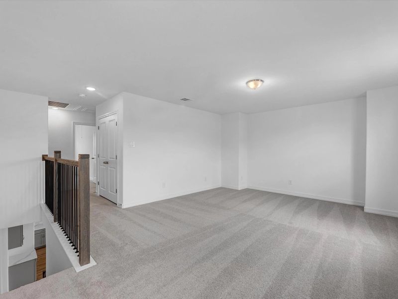 Upstairs loft. Sample product photo. Actual exterior and interior selections may vary by homesite. Photo may be virtually staged.