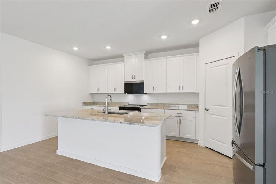 Furnished interior view inside a new home in Colbert Landings, Palm Coast (Image 7).