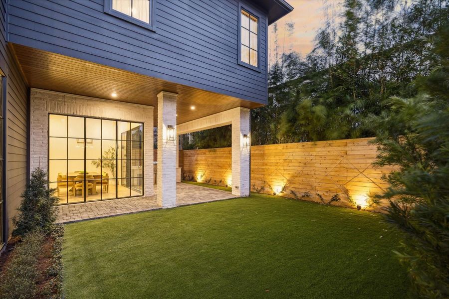 The back yard and pavilion are home to limitless possibilities: add a pool or garden, or simply enjoy the low maintenance turf. Fully fenced in natural wood and beautifully landscaped.