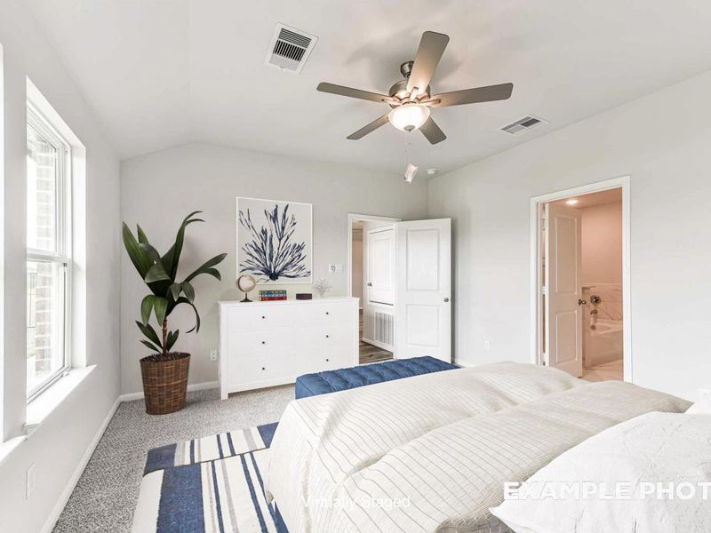 Furnished interior view inside a new home in Sunterra, Katy (Image 15).