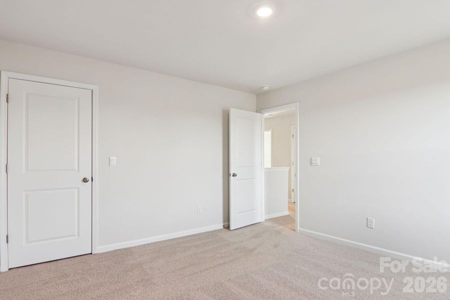 Spacious, unfurnished interior of a new home in Rydele Heights, Asheville (Image 29).