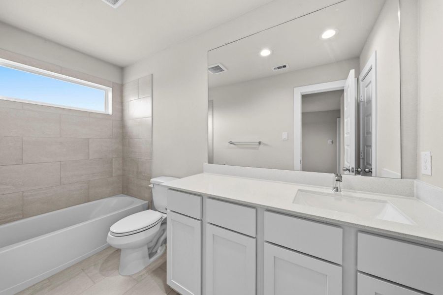 Furnished interior view inside a new home in Sunterra Lakes, Fulshear (Image 8).