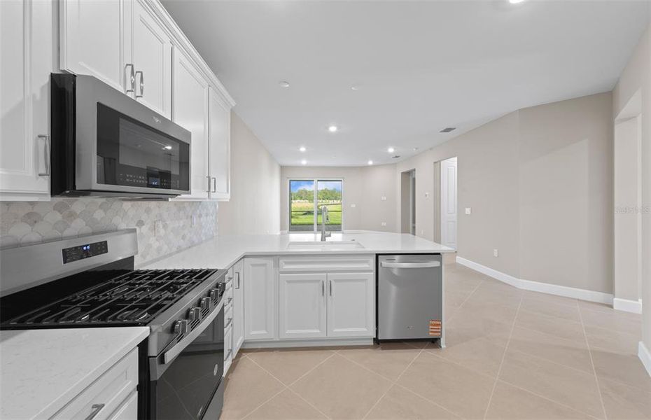 Furnished interior view inside a new home in BeachWalk by Manasota Key, Englewood (Image 5).