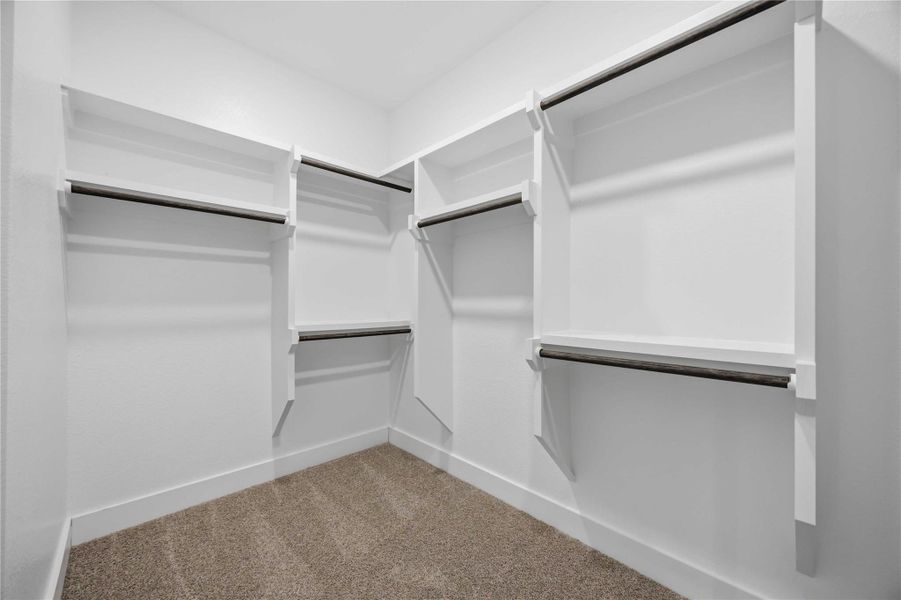 Spacious, unfurnished interior of a new home in Ellwood, Iowa Colony (Image 25).