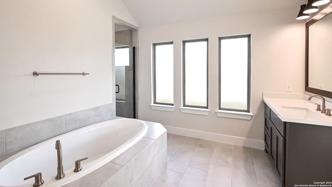 Furnished interior view inside a new home in Cibolo Valley Heights 65', Cibolo (Image 9).