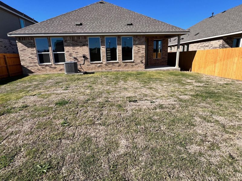 Exterior details and patio area of a home in Rosenbusch Ranch, Leander (Image 2). Exterior details and patio area of a home in Rosenbusch Ranch, Leander (Image 2).