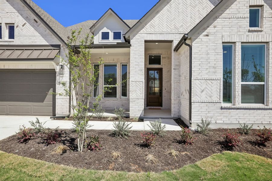 Exterior details and patio area of a home in 6 Creeks, Kyle (Image 26).