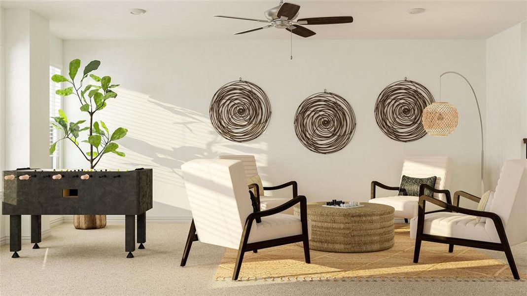 Sitting room featuring ceiling fan