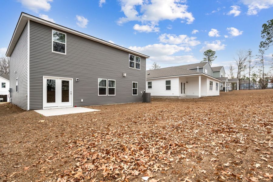 Exterior details and patio area of a home in Grand Arbor, Blythewood (Image 4).