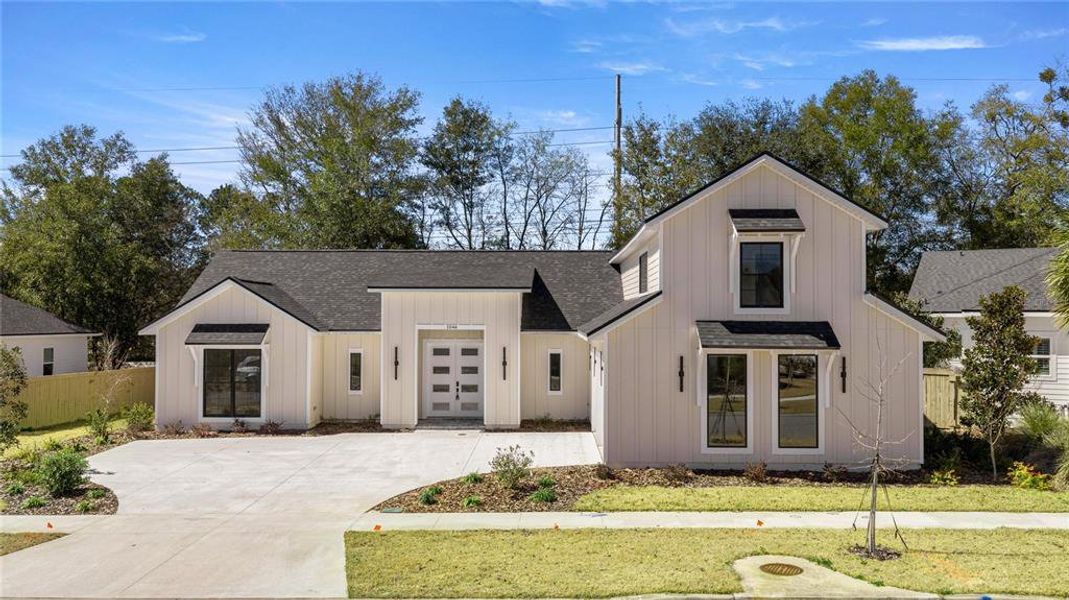 Front exterior of a new home in , Gainesville, FL, highlighting curb appeal (Image 2). Front exterior of a new home in , Gainesville, FL, highlighting curb appeal (Image 2).